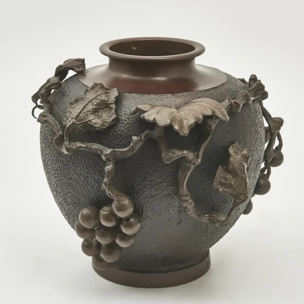 Japanese Patinated Bronze Jar With Vine Decoration