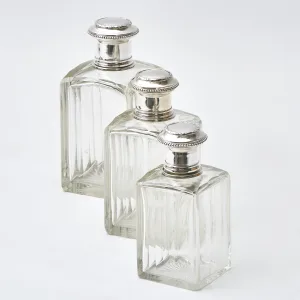 Set Three Cut Crystal Perfume Bottles With Silver Tops