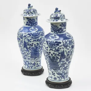 Pair Blue And White Vases And Covers On Carved Wood Bases